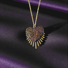 Charger l&#39;image dans la galerie, NUNE collier doré Vénus en forme de cœur style ex-voto en cuir noir pailleté irisé recyclé, sur fond noir
